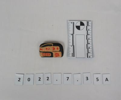 Carving, killer whale pin.
