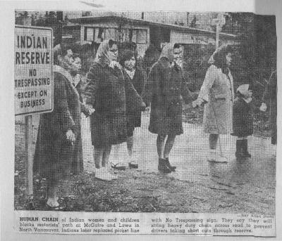 Human Chain of Indian women and children blocks motorists' path at McGuire and Lawa in North Vancouver
