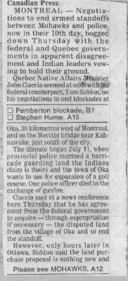 ["Negotiations to end armed standoffs between Mohawks and police..."]